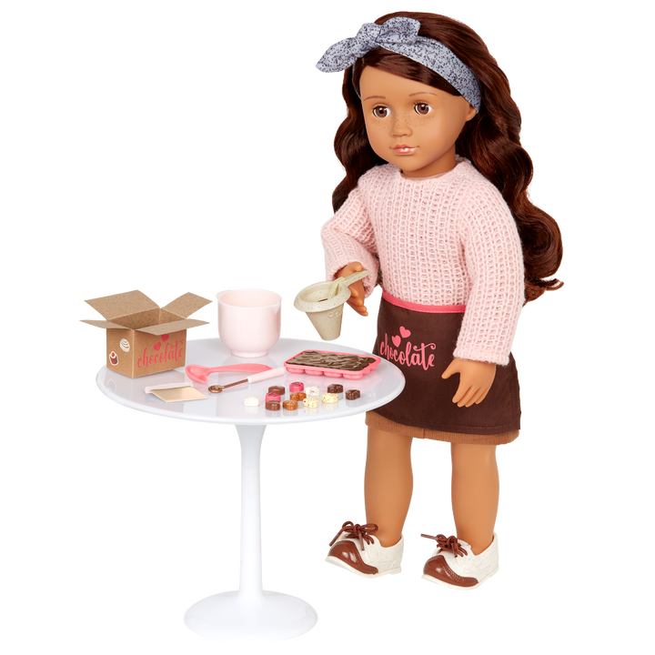 Coco - 46cm Chocolate Making Doll - Doll Baker with Chocolate Making Accessories - Doll & Storybook - Posable Doll - OG Doll with Brown Hair & Eyes - Toys & Gifts for Kids - Our Generation UK