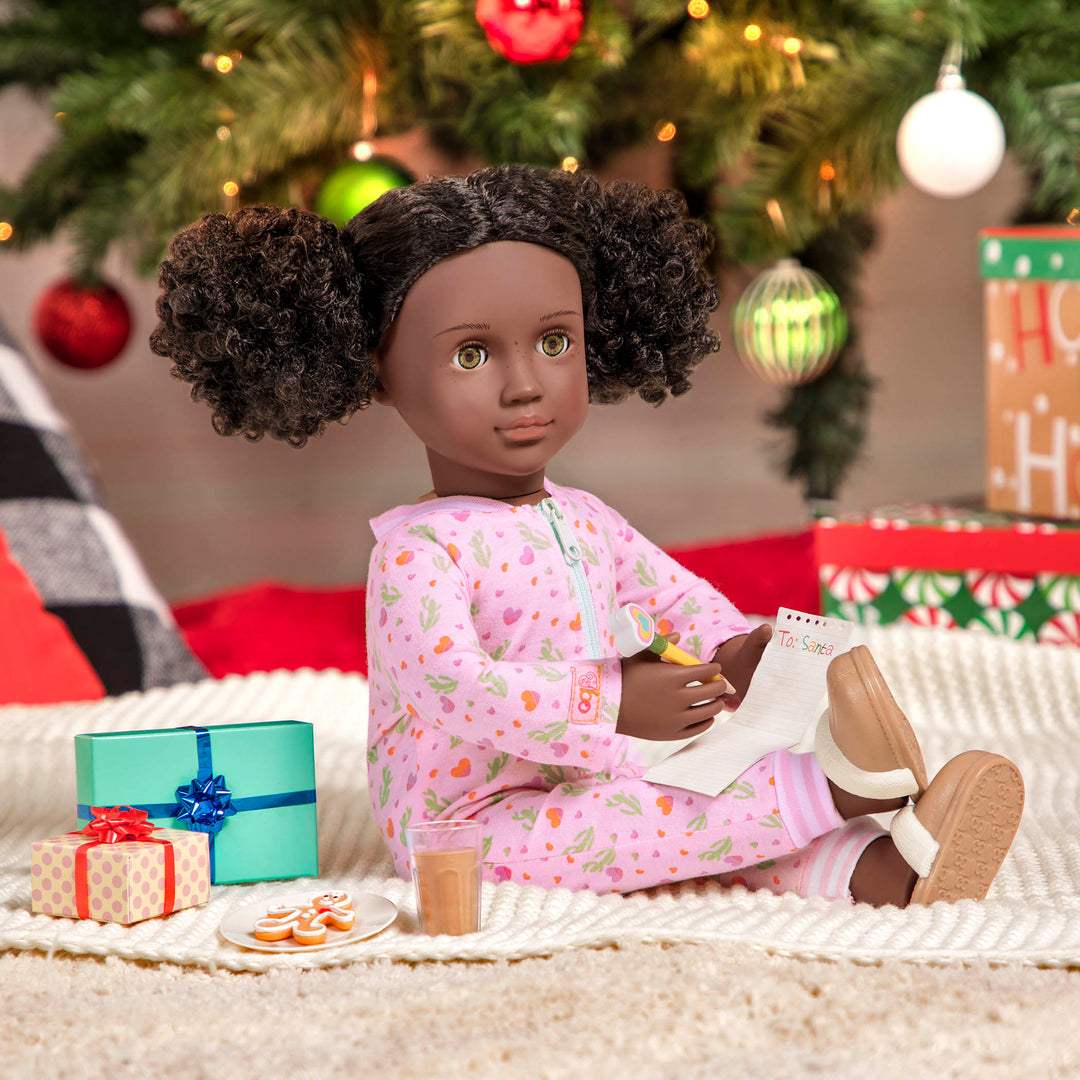 Doll under Christmas Tree writing Letter to Santa