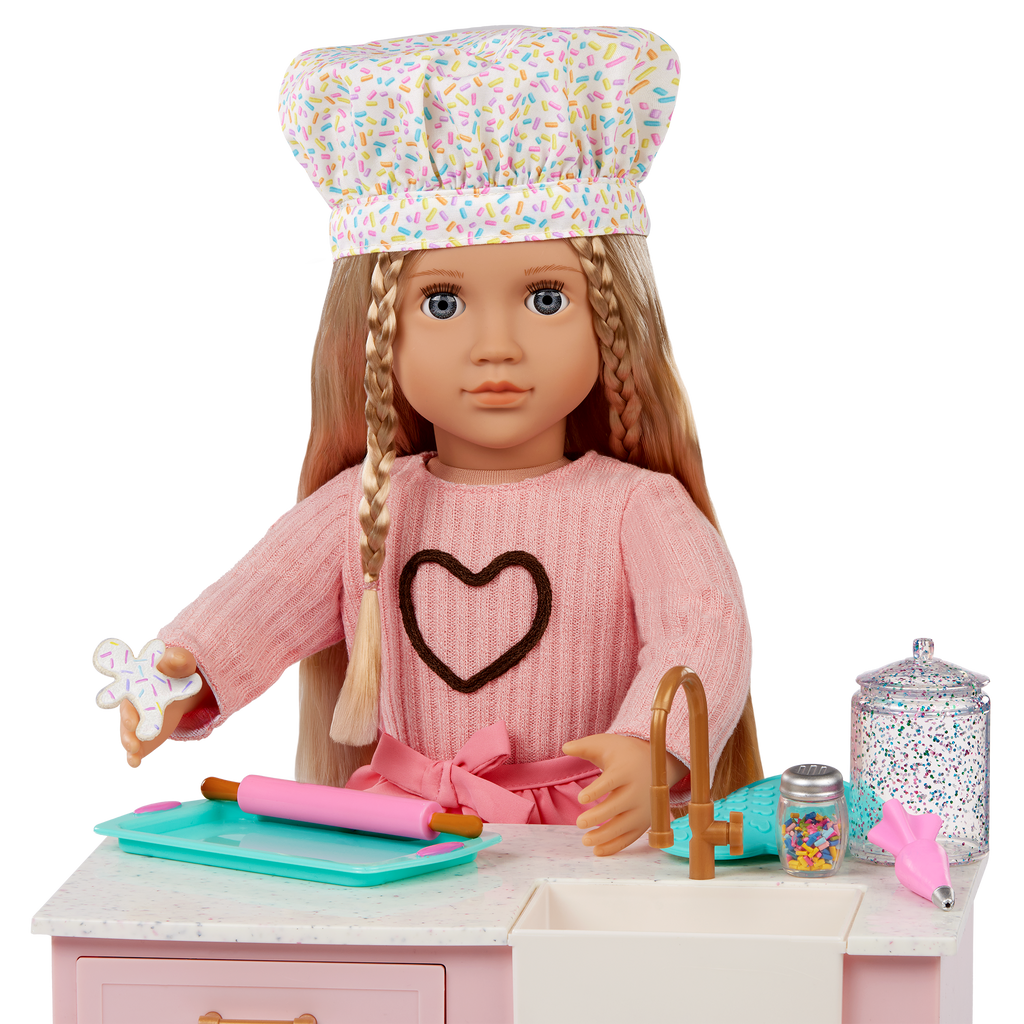 Emery - 46cm Baking Doll & Book - Posable Doll with Blonde Hair- Baking Accessories for Dolls - Chapter Story Book - Gifts for Ages 3 Years + - Our Generation UK